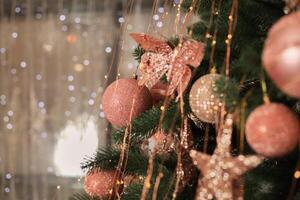 Christmas tree blur garland close-up New year background photo