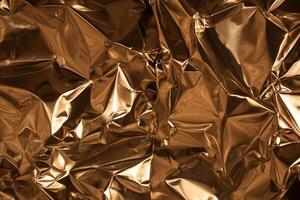 Full frame take of a sheeT of crumpled gold aluminum foil photo