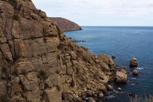 seascape with rocky cliffs photo