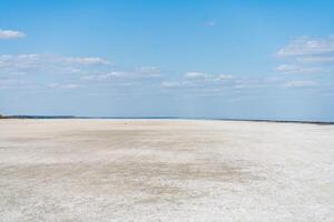 Dry sea endless sand beautiful clouds beautiful landscape estuary. photo