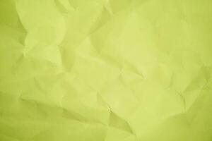 Yellow Sheet crumpled paper color background  Close up Copy space photo