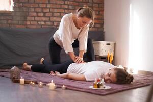 Relax and enjoy in spa salon, getting thai massage by professional masseur. photo