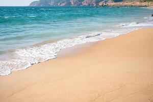 Clear turquoise sea and waves photo