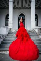 Woman Vintage Red Dress Old Castle Beautiful Princess In Seductive Dress photo
