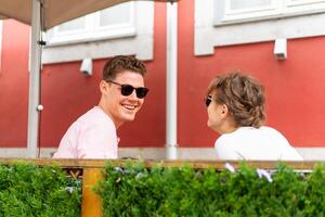 Flirting in a cafe. Beautiful loving couple sitting in a cafe photo