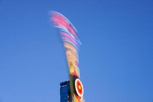 Amusement park blurred effect. Abstract illuminated background photo