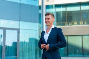 Business. Businessman Standing City Street Near Office Building photo