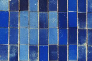 blue rectangular tile texture with little cracks photo