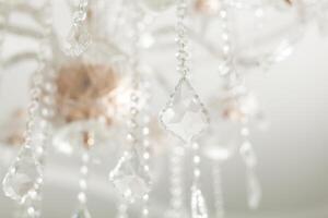 Chrystal chandelier close-up. Glamour background photo