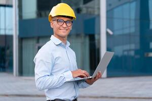 Business, Architect Using Laptop Outdoors Office Building Background photo