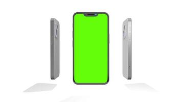 Four aluminum smartphones with green screen rotating 360 degrees against white background. Loop sequence. 3D animation video