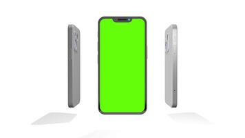 Four aluminum smartphones with green screen rotating 360 degrees against white background. Loop sequence. 3D animation video