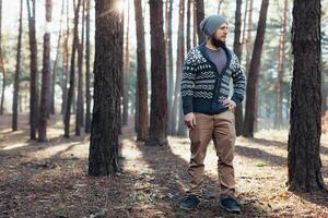 Outdoor portrait of handsome bearded man . Casual autumn fashion portrait photo