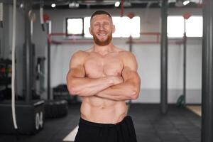 Athlete sportive man gym Middle adult handsome sportsman bodybuilder weightlifter ideal body photo