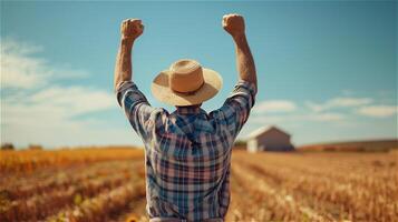AI generated Back view of a male farmer raising his hand to the sky with clear sky background photo