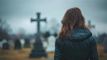 AI generated Back view of woman in black standing in front of the grave photo