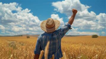 AI generated Back view of a male farmer raising his hand to the sky with clear sky background photo