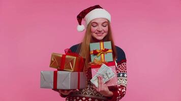 Christmas Girl holding gift boxes, concept of spending money, shopping online, cash dollars falling video