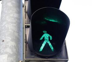 Green and red traffic lights for pedestrians and cars photo