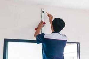 Air conditioning technicians prepare to install new air conditioners in home, Air conditioner repair and installation concepts photo