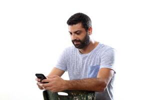 young man with a beard in several different situations photo
