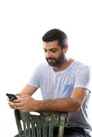young man with a beard in several different situations photo