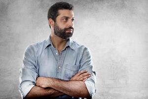 young man with a beard in several different situations photo