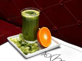 Healthy and detoxifying fruit and vegetable juices photo