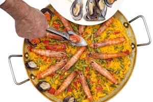 step-by-step guide to Seafood Paella, the most typical in Spain photo