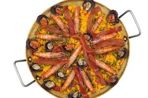 step-by-step guide to Seafood Paella, the most typical in Spain photo