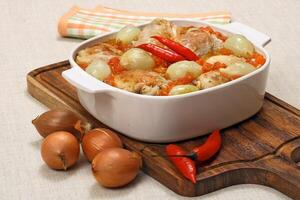 chicken stew with onions and red pepper photo