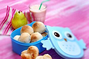 cheese breads, dried fruits and white cheese for children's snacks photo