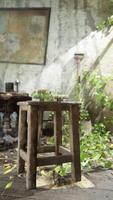 An abandoned room with a chair and table in a state of devastation video