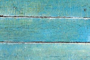 colorfull old painted horizontal wooden plank with crack and scratches background photo