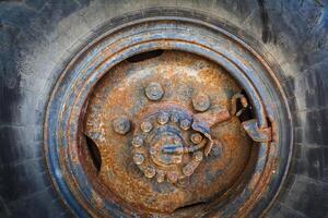 close up  of an old, rusty wheel. iso 100, heavy processed for hdr tone mapping effect. photo