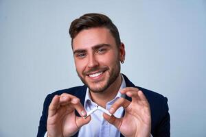 Close up portrait young man businessman. Caucasian guy business suit studio gray background. photo