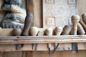 Wood carving tool Carpenter tools in stand at workplace photo