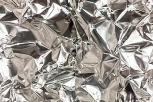 Full frame take of a sheeT of crumpled silver aluminum foil photo