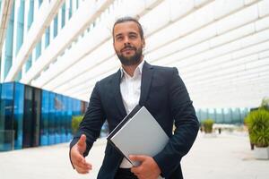 Business. Businessman Giving Hand For Handshake photo