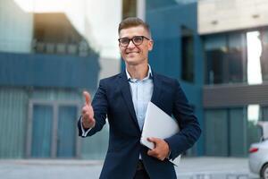 Business. Businessman Giving Hand For Handshake Welcome Gesture photo