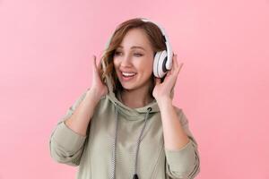 Happy teeth smile woman listen music headphones photo