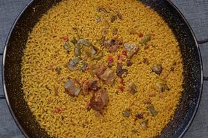 Classical paella sea and mountain photo