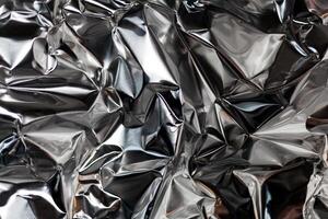 Full frame take of a sheeT of crumpled silver aluminum foil photo