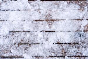 Winter background. Empty wooden plank with snow border, copy space for text photo