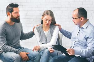 Domestic violence victim on therapy with support group photo