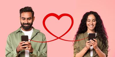 A man with a beard in an olive shirt smiles at his smartphone, and a woman with curly hair photo