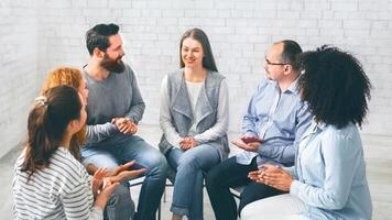 Community Members Applauding To Mentor At Therapy Session In Rehab photo