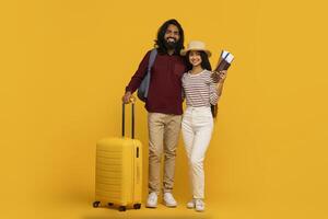 Couple with luggage ready for holiday travel photo