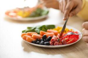 Selective focus on plate full of nutritive food photo