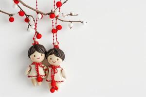 AI generated Traditional martisor shaped as man and woman on white background. Beginning of spring celebration photo